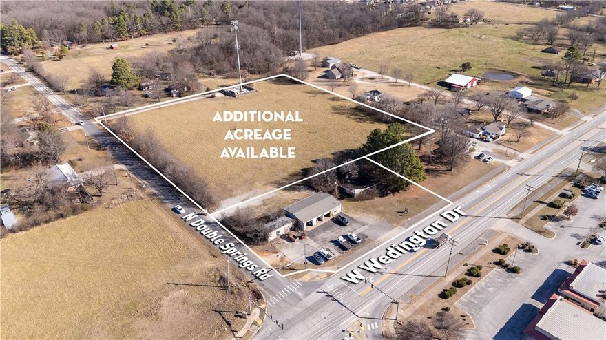Prime location as growth is expanding west on Wedington Dr. Property is located at the northeast corner of W Wedington Dr & N Double Springs Rd at a 4-way lighted intersection. Less than 10 minutes to I-49 access. Value is in the land, buildings on property sold AS-IS.

2 parcels totaling 1.20 acres.
373' of frontage on W Wedington Dr.
16,000 CPD that will continue to grow.
Water & Sewer at street.