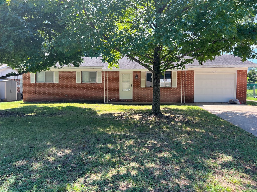 Brick 3 BR/1.5 Bath home with fenced backyard. Convenient location, close to Schools. New Carpet and Paint. Clean and ready for new occupants. Comes with dishwasher and stove. No pets. Large backyard with shade tree.