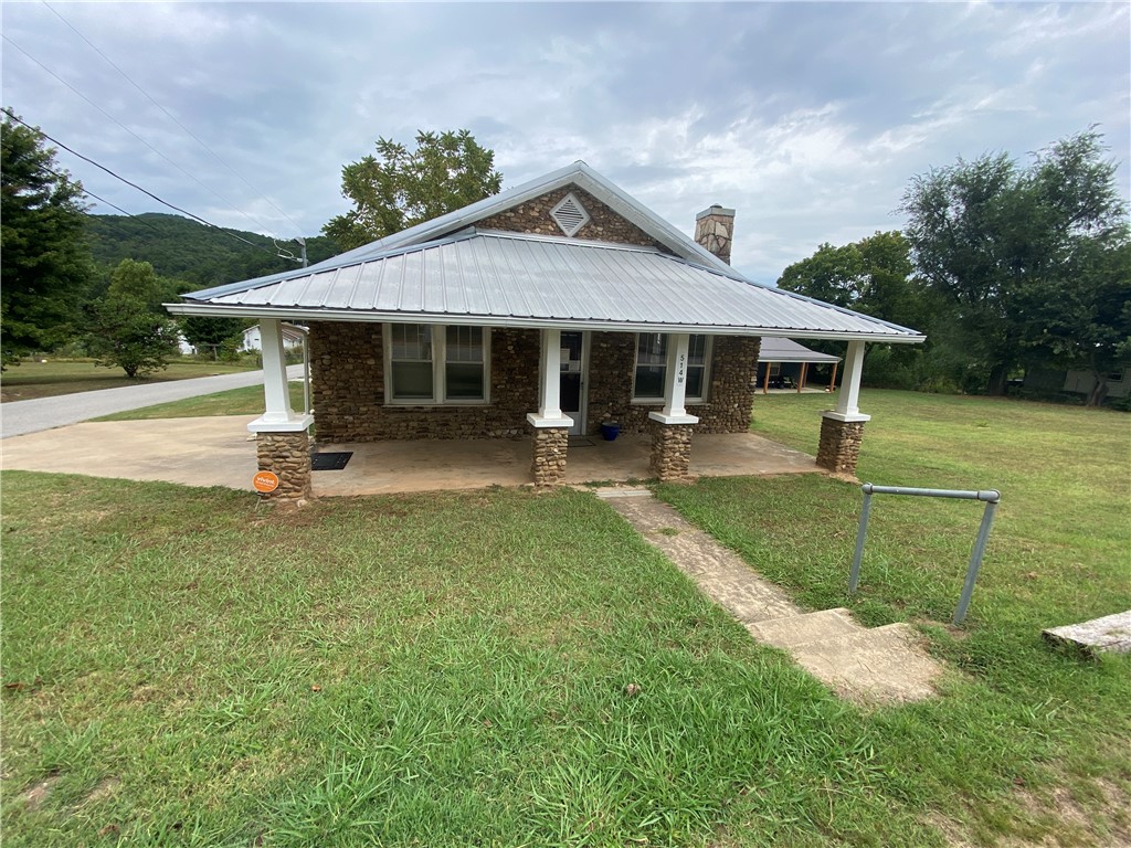 This 1215 SF medical office space is located in the quaint town of Jasper, Arkansas near the Little Buffalo River in the Ozark Mountains and Buffalo National River Region of Newton County Arkansas. Most recently been used as a Chiropractor facility with a large waiting area, receptionist area, two treatment rooms, break area, restroom and medical provider private offices. It can only be used as residential or used as a medical (including chiropractor) facility. This building is within walking distance to the historic Jasper Square (eating, shopping, services), Bradley Park (on the Little Buffalo River, pickle ball, swimming) and Jasper School (just across the street). Partial basement (with walkout & access from inside) perfect for a storm shelter and storage. Newer HVAC, has a fireplace and maintains current termite policy. It is located in beautiful Newton County, Arkansas and near the Ozark National Forest. Also listed as residential MLS# 1319504.