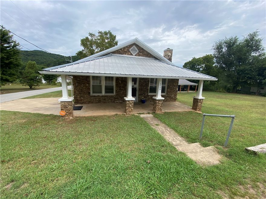 This 1215 SF medical office space is located in the quaint town of Jasper, Arkansas near the Little Buffalo River in the Ozark Mountains and Buffalo National River Region of Newton County Arkansas. Most recently been used as a Chiropractor facility with a large waiting area, receptionist area, two treatment rooms, break area, restroom and medical provider private offices. It can only be used as residential or used as a medical (including chiropractor) facility. This building is within walking distance to the historic Jasper Square (eating, shopping, services), Bradley Park (on the Little Buffalo River, pickle ball, swimming) and Jasper School (just across the street). Partial basement (with walkout & access from inside) perfect for a storm shelter and storage.  Newer HVAC, has a fireplace and maintains current termite policy. It is located in beautiful Newton County, Arkansas and near the Ozark National Forest. Also listed as residential MLS# 1319504.