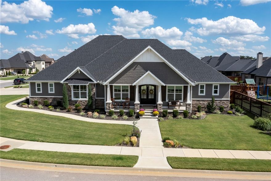 CUSTOM PERFECTION! From the moment you pull up, you FEEL the detail.The walkway, the steps, the double doors...Opening up to classic, timeless yet updated in all the right places! One level home with: Finished in place hardwood floors, wood beams, rock fire place to the ceiling, built ins, double island, double ovens, pot filler, and THE PANTRY: just an extension of your kitchen, you won't want to close the door! Bonus/media room with built ins and sink. Second bedroom with it's own full bath. 2 more bedrooms sharing a J&J bath. The feature walls in the bedrooms and the hallway woodwork is gorgeous. The oversized owners suite with beam detail, the dressing area you didn't know you needed, this closet! OH MY!  Over sized garage for those extended vehicles and toys, storm shelter, BIG covered entertaining area outside, separate fire pit patio area, flat lot, Amazing pools, play areas and club house in this highly sought after gated community. The photos do not do this one justice.
