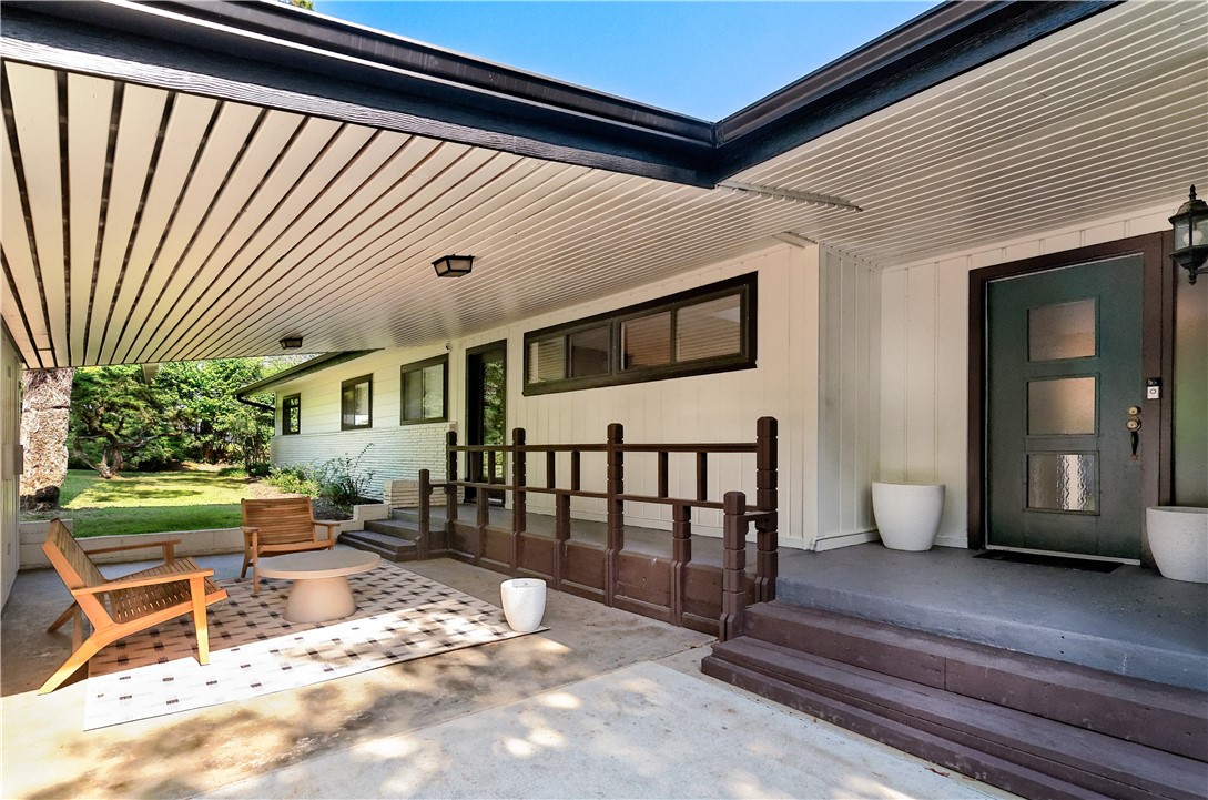 Indulge in the architectural excellence of this mid-century gem, Just a stone's throw from Razorback Stadium, this unique home boasts recent kitchen enhancements with new counters, backsplash, and stainless steel appliances. Each of the three baths has been elegantly updated with new counters and fixtures. Revel in modern living throughout, basking in the natural and LED lighting of the spacious living areas and have a piece of mind with smart thermostats. The master suite, complete with an attached office, offers a retreat within. Discover the potential of an additional bonus room that could easily serve as a fifth bedroom. Set on a generous oversized lot, this residence is a rare find, marrying architectural brilliance with contemporary comfort. Your dream home awaits! Roof was replaced in 2022.