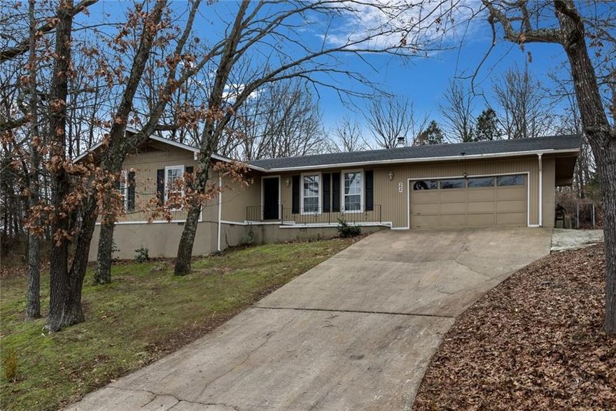 You'll fall in love with this charming 1970s ranch style home! Boasts large kitchen w/bar seating that is open to dining area, cozy living room w/wood stove, large bedrooms, & ample closet space. Updated kitchen & bathrooms. Deck leads to spacious fenced back yard w/raised garden beds & storage building. Newer HVAC & HW heater. Brand new garbage disposal & dishwasher. Walk to Lake Windsor & trail access leading to BV trail system! Easy access to 71B & I-49. Perfect for investors or first time buyers.