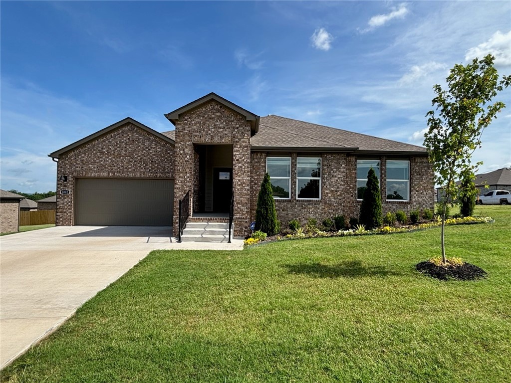 Delightful Dean Plan in Rolling Meadows, in Pea Ridge, Arkansas! Each home in Rolling Meadows is meticulously crafted with attention to detail, creating a space that feels both luxurious and welcoming. From the moment you walk through the door, you'll be greeted by modern features and spacious a layout that caters to every lifestyle. Our homes boast premium finishes and thoughtful designs, ensuring that you'll be stepping inside your own personal oasis. These homes will be complete with LVP flooring throughout (two-story plans will have carpet on stairs and upstairs) and wood shelving in all closets, pantry, and utility room. The kitchen will have quartz kitchen counters, 36-inch cabinets, and stainless-steel appliances with a Gas Range! The primary bath will feature quartz countertops, double sinks, and a walk-in shower. Each home comes with 4-sided brick with Hardie ® fascia per plan. Home will have a Garage Door Opener. Taxes and Parcel TBD.