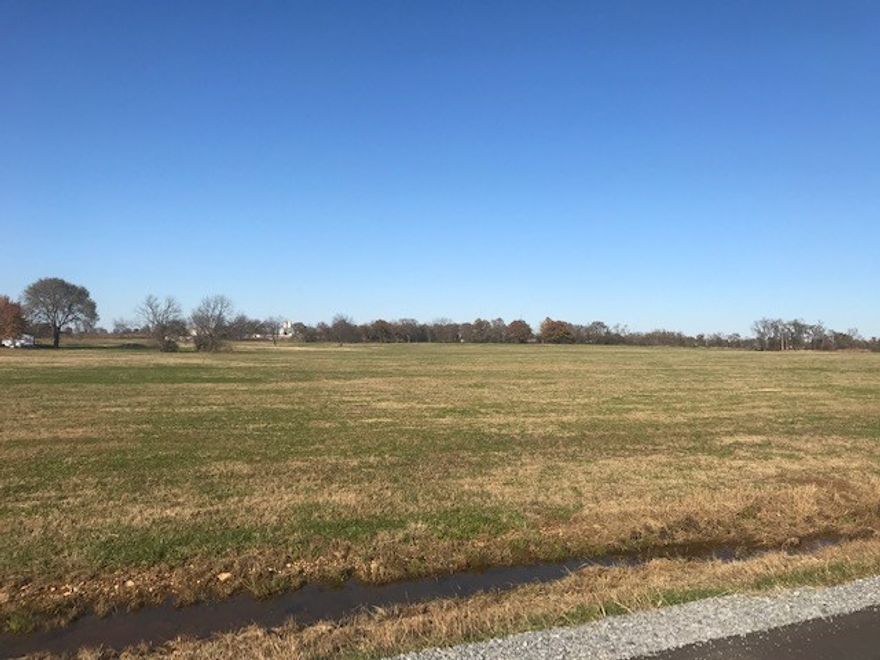 Great Development potential near new schools in Centerton and existing subdivisions. City water on site  and sewer is available across road.   This 40 acres consist of  2 parcels  and land is cleared and gently rolling would make great location for a subdivision.  Modular home does not convey.
