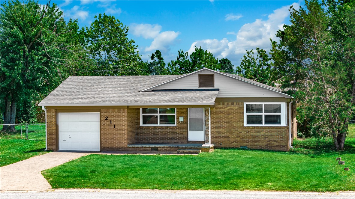 Tucked at the end of a cul-de-sac and minutes from everything, this one’s all about location and potential. Want to be connected to downtown Rogers and the Greenway Trail System? This is it! With a new roof, double pane windows, fresh paint, updated HVAC, remodeled kitchen and bathroom, the heavy lifting’s already done. The oversized backyard is ready for whatever you dream up—garden, pets, or weekend hangouts. There is an additional large storage room off the back porch of the garage as well! Whether you're starting out or investing, this home is a solid move or investment.