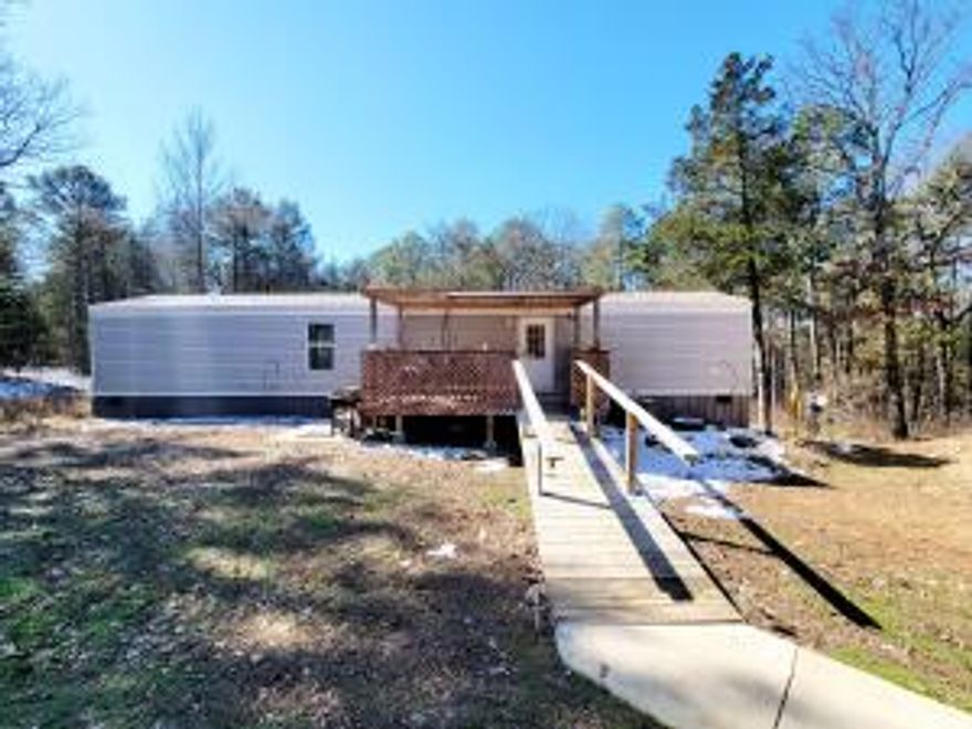Charming 2-Bed, 2-Bath Home on 10.17 Wooded Acres with 30x30 Shop!Escape to the country with this well-maintained single-wide home, just a few years old, nestled on 10.17 acres of beautiful wooded land. This cozy 2-bedroom, 2-bathroom home offers comfortable living with modern features, making it a perfect retreat for those seeking privacy and space.The property includes a 30x30 shop with electric and a concrete floor, providing ample space for storage, hobbies, or a workspace. With plenty of room to roam, this land is ideal for outdoor enthusiasts, nature lovers, or those looking to expand.Don't miss out on this incredible opportunity to own a peaceful slice of the countryside!