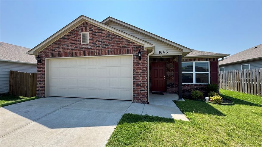 Welcome to 1643 E Towhee Ln, a well-appointed 3-bedroom, 2-bathroom home with home office offering 1,612 square feet of comfortable living space in a convenient Fayetteville location.

Inside, you'll find a functional open layout with luxury vinyl plank flooring throughout the main areas and tile in the wet spaces. The kitchen features upgraded cabinets, granite countertops, and a flush bar top—ideal for everyday meals or entertaining.

The primary suite includes a walk-in shower and generous closet space, while two additional bedrooms provide flexibility for guests, a home office, or a growing household. Recessed lighting adds a modern touch throughout the home.

Located near local trails and parks, this home offers easy access to outdoor recreation and community amenities. A great opportunity for those looking for a move-in ready property with quality finishes and a practical layout.