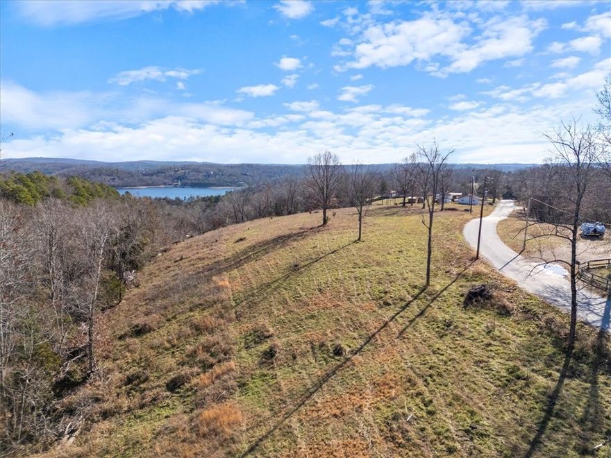 Quiet and peaceful area with homes being built up to $3,000,000 plus for full-time and part-time living.  Lot provides elevated view of Beaver Lake. Public Water, Electric and Cable at street. Located in an low traffic area and close to Rocky Branch Marina.
Excellent area for your home for life or summer/weekend home.