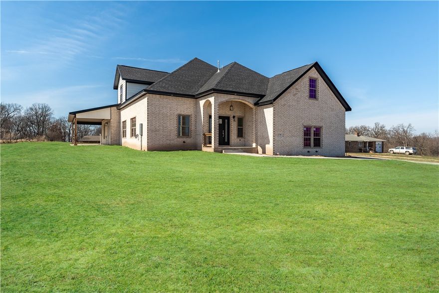 $10,000 FLEX CASH towards buyer's expenses including but not limited to buying down your interest rate or towards buyer's closing cost. Discover modern living in this brand-new, 3,387 square foot home located in the vibrant city of Tontitown, AR. This meticulously crafted residence boasts contemporary design and spacious interiors. Entertain effortlessly in the open-concept living areas, complemented by high-end finishes and abundant natural light. With a prime location, enjoy easy access to nearby entertainment venues, local restaurants and local small businesses, making this home an ideal haven for those seeking both style and convenience. Indulge in the local charm with proximity to the renowned Tontitown winery, offering a delightful escape for wine enthusiasts. Experience the convenience of having this acclaimed winery just moments away from your doorstep, adding a touch of sophistication and leisure to your new, stylish lifestyle.