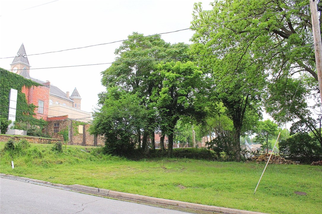 Desirable Lot located in the center of downtown Fayetteville, behind the courthouse and across from the farmer's market square. Lot is zoned Downtown General (DG) and allows for a multitude of residential, office, cafe, and retail development possibilities. Great opportunity to keep modernizing central and south Fayetteville! This lot could allow for up to 5 or 6 townhomes to be built. DG Zoning regulations are attached. Major development potential and lots of other new construction happening close by!