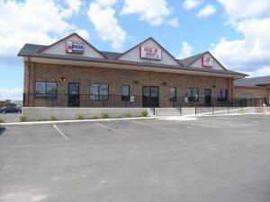 Yearly income of $120,000!!! This incredible commercial building is located on East Main across from Wal-Mart. The large building includes 16,000 sf with one long term tenant in place and the other side is completely rented to a local restaurant! Great parking, excellent visibility, and endless potential in the heart of Russellville right on Main!