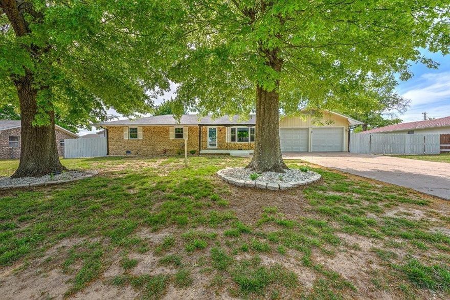 Discover this beautifully updated 5-bedroom, 3-bath home in the heart of Rogers! Featuring an eat-in kitchen with granite countertops, a cozy wood-burning fireplace, and a bright sunroom, this property blends comfort with convenience. Situated on a 0.37-acre landscaped lot, the home includes a detached guest house, workshop, and a storm shelter for added peace of mind. Outdoor living shines with a covered brick patio and private fenced yard — perfect for entertaining. With its prime location near parks, schools, and the business district, 1902 S. 16th Street offers space, versatility, and lifestyle all in one.