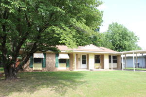What a gem! This charming 3 bedroom, 2 bath home has a huge living area plus a spacious eat in kitchen! The utility room offers ample storage and there is even a small shop in the privacy fenced back yard. There is a new roof, new windows and doors, new vanities and fixtures, new flooring, new paint, and more! This home is truly move in ready and priced right!