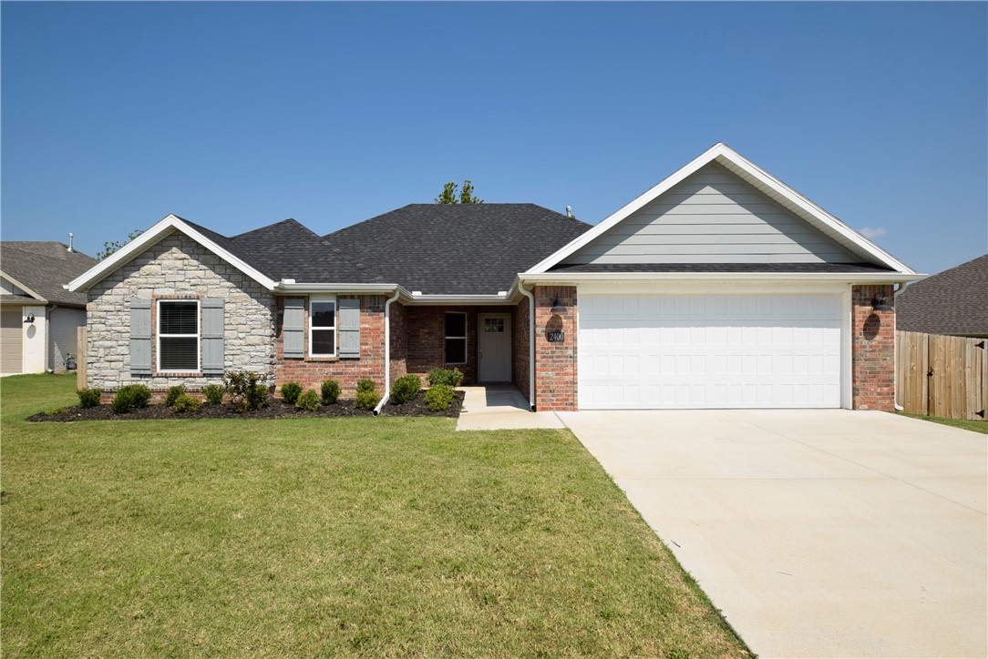 Welcome to Deere Creek near Elm Springs, AR! This beautifully designed Hickorywood Plan offers 4 bedrooms, 2 baths, and 1,841 sqft of stylish, functional living space. The open-concept layout features granite countertops, custom cabinetry, a spacious pantry, and a cozy gas fireplace, all bathed in natural light. The master suite offers a serene retreat with a separate tub and shower. Enjoy seamless flow between the living, dining, and kitchen areasāperfect for hosting or relaxing. Step outside to a covered patio ideal for entertaining and enjoying the peaceful surroundings. Neighborhood amenities include scenic walking trails, adding to the charm and sense of community. This move-in ready home blends comfort, elegance, and convenienceādonāt miss your chance to make it yours!