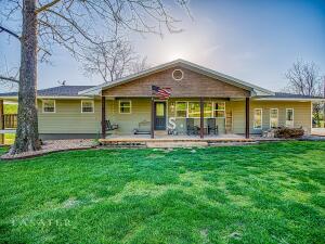 This is your chance to own a Newly Remodeled 4 bedroom, 3 bath home located on a little over 4 acres. This property has it all! Land, creek, beautiful home, above ground pool, hot tub, storage and the outdoor entertainment possibilities are endless! A small barn, covered parking for boat or RV are just a few extras to mention. If you love country, this home is calling your name! The creek runs across the back side of property and a spring onsite. Call me today to take a look!