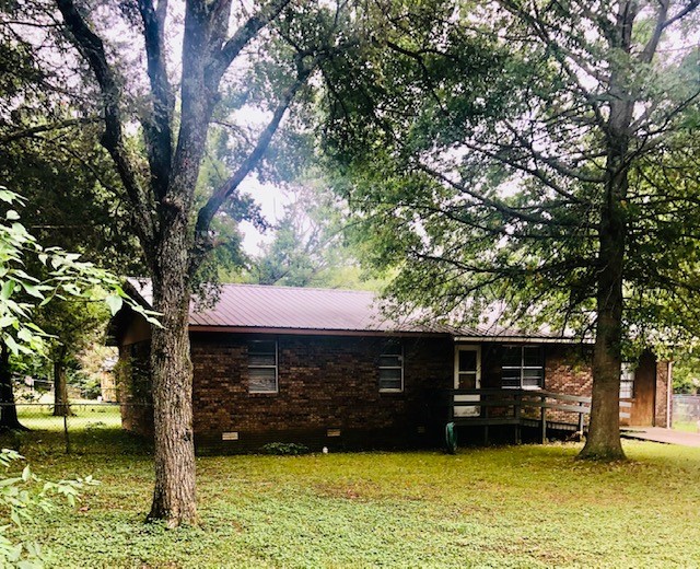 If you are looking for an affordable home that you can enhance with your cosmetic touches, this 1404 sq. ft. home lives as a 3 bedroom, 1 bath with 2 living areas. The 2nd living area is a garage conversion. Open u shaped kitchen/dining has a pantry, a gas range and back yard barbecue access. The centrally heated home built in 1973 has a fenced back yard with 2 storage buildings and is a convenient walk to West Forksā Carter Park and also West Fork Riverside park. Level and accessible with a ramp to the front entrance. The 1 installed window AC unit conveys with the house, as well as the 2 additional window AC units not installed (in kitchen). Priced at $129,900.