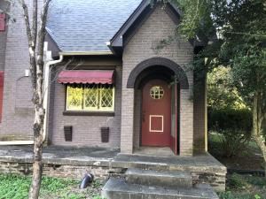 Historical Downtown Russellville is the setting for this Custom built home. Only 3 owners before you have enjoyed this address. Lots of built-ins, nice white oak real wood floors, arched doorways, and lots of trim. This 3 bed 2 bath home was remodeled about 10 years ago, so some paint and a few updates , a little TLC inside and out in the yard and your time will make this a show place. The sunroom, large living area, formal dining, and spacious kitchen all have the reminders of yesterday, and the touches of today to make you proud to live on this street. Windows have been replaced, lots of tile and cabinets. This home was built with imported Cyprus from Brazil, with quality in mind from its beginnings. Bring your talents and reap the benefits of dreams. Book a tour today...