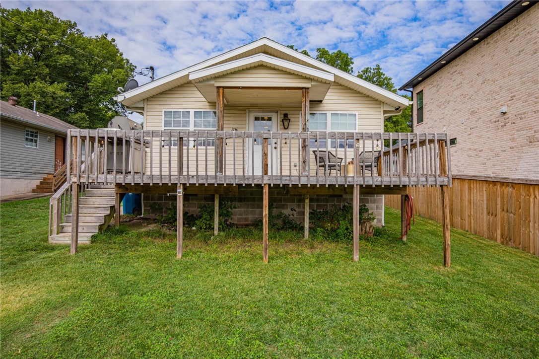 Amazing ownership opportunity just North of Downtown Bentonville, with direct access to the Bike Trails. This is a great investment property, to use as it is currently, for short term rental or to re-develop. The location is in an area that is currently being re-developed and offers a large lot.