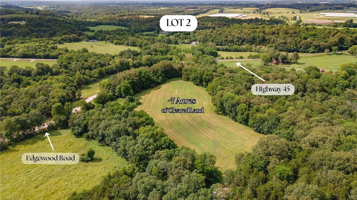 Incredible lot with a 4 acre cleared manicured building site! Drive 15 minutes to town for all of the modern amenities at the intersection of Crossover and Mission in East Fayetteville. Utilities are available and this site has been perc tested!