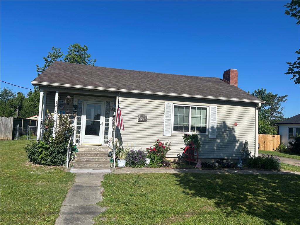 Charming 2-bed cottage w/NEW ROOF in sought-after Central Rogers! This quaint gem, of a home, offers an unbeatable, prime location near it all! Just minutes from vibrant downtown Rogers, enjoy easy access to top-rated schools, Lake Atalanta, The Railyard, The Razorback Greenway, shopping, and all the amenities this thriving city offers. Plus, you're just a stones throw from beautiful Heritage High School! Inside, discover original hardwood floors, a cozy gas fireplace in the living room, and a large dining room perfect for gatherings. A tankless water heater adds modern convenience. Expand your living space or take advantage of the abundant storage space with the spacious unfinished bonus room upstairs – imagine the possibilities! Huge backyard, A detached garage and fenced yard complete this fantastic package. Don't miss this rare opportunity to own in a prime location , near it all right off Hwy 71B in Rogers. This is your chance to get into a great neighborhood and enjoy all that bustling Rogers AR has to offer!