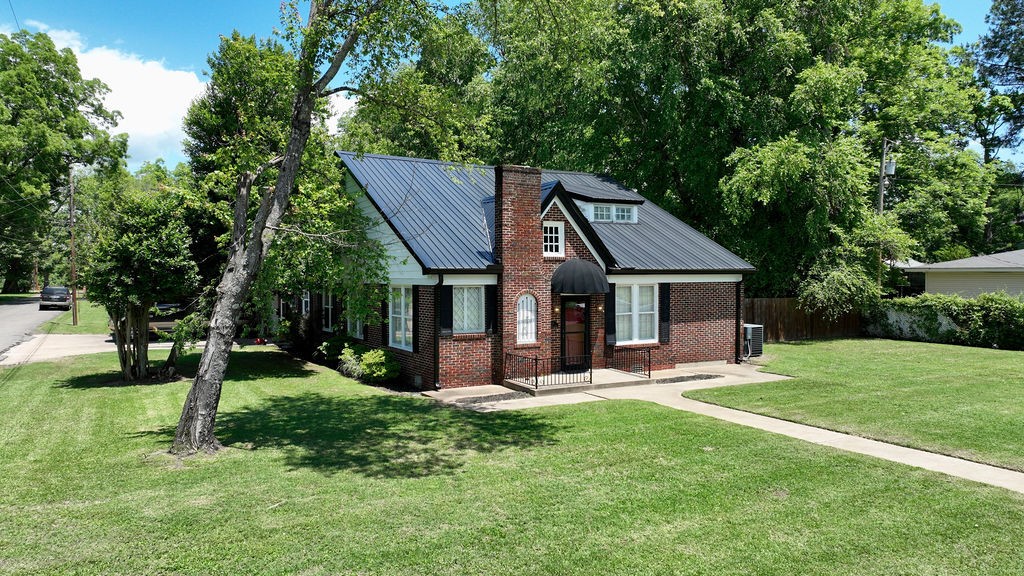 Large brick cottage one block from the Arkansas River in historic Dardanelle, Arkansas. on a huge lot with a workshop. 2900 square feet central heat and air,home new roof, leathered quartz countertops, brick tiled floor in kitchen and laundry, hardwood floors throughout main level. Large closets, The charm and character are evident in every room. only 10 minutes from Main Street Russellville. Join the quiet peaceful atmosphere of Dardanelle, home of the movie ''True Grit''.
