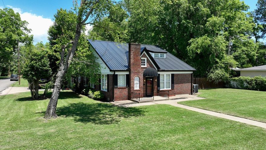 Large brick cottage one block from the Arkansas River in historic Dardanelle, Arkansas. on a huge lot with a workshop.  2900 square feet central heat and air,home new roof, leathered quartz countertops, brick tiled floor in kitchen and laundry, hardwood floors throughout main level.  Large closets,  The charm and character are evident in every room.  only 10 minutes from Main Street Russellville.  Join the quiet peaceful atmosphere of Dardanelle, home of the movie ''True Grit''.