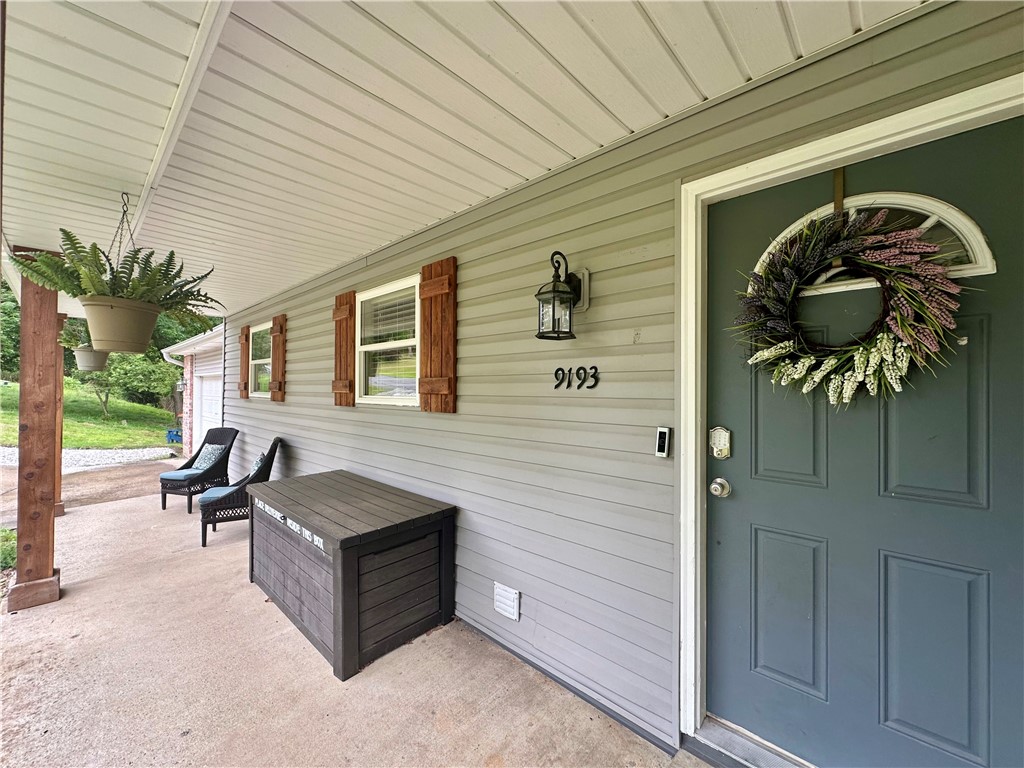 Mere minutes from multiple Beaver Lake access points, including Prairie Creek Marina. This 4 bedroom/3 bath brick home sits on double lot. And with no neighbor on one side, nor behind, your wooded lot provides privacy. Two spacious bedrooms on main level, with decking extending from kitchen area to primary bedroom. Downstairs features second living area, mini kitchen, and second eating area with 2 more spacious bedrooms, as well as additional storage space. Covered deck area off downstairs extends your fun and entertaining, or just your quiet time as you spot the various wildlife or recover from your day out on the lake. Enjoy all that this home has to offer!