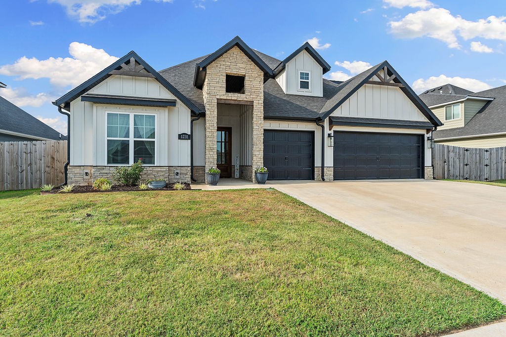 Welcome to your dream home in one of Centerton's most inviting neighborhoods! This 4-bedroom, 3 full-bath (plus bonus room) residence offers modern comfort, plenty of space, stylish upgrades, and a location that’s hard to beat. Step inside to find a bright, open layout featuring upgrades throughout—from elegant finishes to rich flooring that flows seamlessly through the living spaces. The kitchen boasts sleek countertops, stainless steel appliances, a gas cooktop and plenty of storage. The spacious primary bedroom with spa-like en suite is conveniently located on the first floor. Enjoy the convenience of a three-car garage plus an additional storage room, giving you plenty of space for vehicles and hobbies. Outside, the private backyard is perfect for relaxing by the outdoor fireplace. As part of this community, you’ll have access to a pool and clubhouse. Located within walking distance to Bentonville West and Gamble Elementary, this home blends comfort and convenience in a perfect package.
