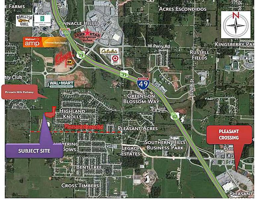 5.07 Acres of land available for sale.  Bank Owned.  Close to I-49 Pinnacle Shopping & Entertainment. NEW ROAD - PINNACLE HILLS PARKWAY