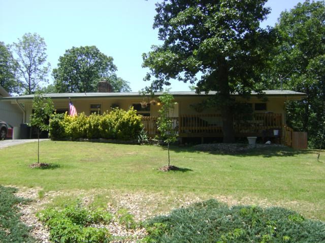 Great value in Bella Vista offers 1,294 sq.ft. 2 bedrooms, one bathroom, gas log fireplace, eat-in kitchen, long single car garage with storage, level and fenced back yard. Front porch has ramp and stairs. Newer septic, HVAC and water heater. Property being sold "as-is"