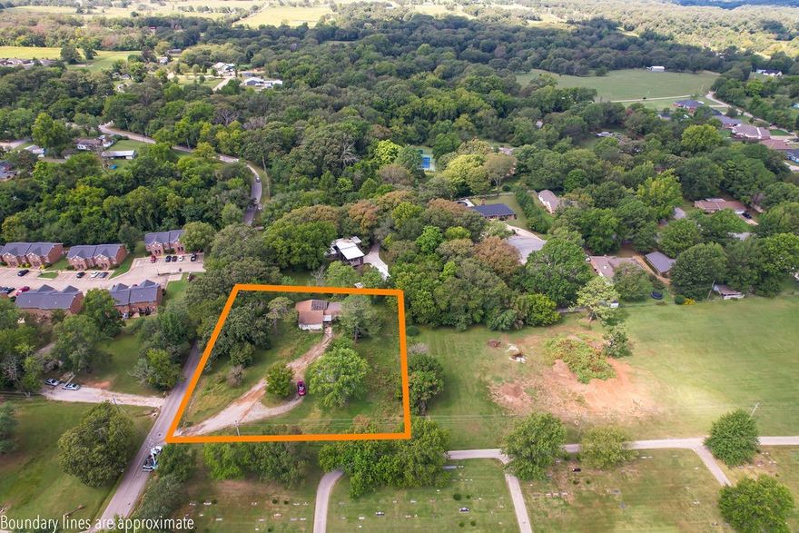 Great development opportunity for townhouses or other investment properties less than one half mile/5 minute walk to John Brown University. Potential development plans (previously approved) are available and attached in MLS. All utilities on site/at street. Existing structures of no value, please do not bother the tenants.
