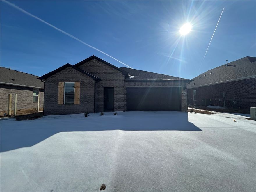 Beautiful Boone plan in Huber Place in Bentonville, AR! Homes in Huber Place are meticulously crafted with attention to detail, creating a space that feels both luxurious and welcoming. Each home will feature a modern electric fireplace with a poplar mantle and LVP flooring throughout. You'll find a ceiling fan in all bedrooms and the living room! These homes will be complete with quartz kitchen counters, 42-inch cabinets, and stainless-steel appliances! The Boone plan offers a lovely office nook/planning room off the kitchen! The primary bath features quartz counters, double sinks, a walk-in shower with tiled walls and a garden tub! The secondary bath will have a tub/shower with tiled walls. Home will have a Garage Door Opener, landscape package, and beautiful 4 Sides brick with Hardie fascia per plan