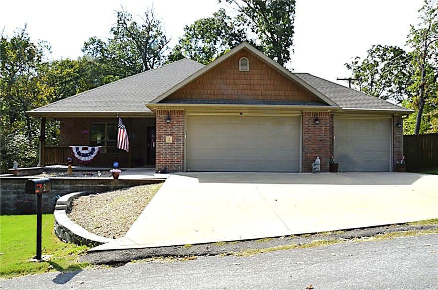 Your future home is conveniently located in the heart of NW Arkansas's playground, close to lakes,
golfing, biking/hiking trails and more. Homes with all these features don't come along everyday. It's rare
to find a single level, all brick home featuring a 3-car garage situated on an oversized .6-acre lot with
public sewer and within the Bentonville School District. Level driveway. This wonderful home offers a
covered front porch area plus a huge back deck that is partially covered making it perfect for those
cookouts with family and friends. The fenced yard is the perfect play area for kids and/or your furry
friends. The gas log fireplace in the LR will make for cozy evenings during the cold winter weather that we experiance in NWA. The MBR is huge and the walk-in shower is a must see. The home and fenced area only covers
about half of the .6-acre single lot. The remaining area could potentially be cleared to make room for a
detached garage, workshop or pool. Or keep it natural for privacy.