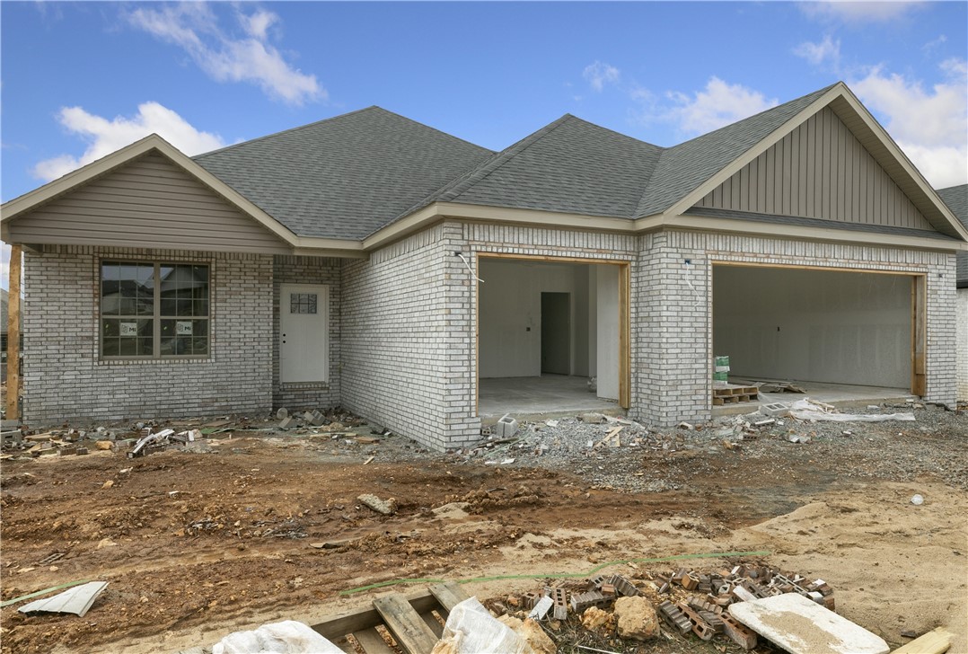 Welcome To Your Next Home! Welcome To The Brand New Brookside Estates Centerton/Bentonville! This North Facing Keane Plan Is One Of Our Most Popular And It's Easy To See Why! Functionality First And Foremost With A Nice Open Split Floorplan Offering Easy Furniture Placement, Living With Vaulted Ceiling And Centered Fireplace, A Pocket Office Area Off Of The Living With Glass Doors, Spacious Primary Suite + 3 Secondary Bedrooms, Custom Cabinets w/ 3cm Countertops Throughout, 3 Car Garage, Covered Front Porch And Back Patio, And So Much More! Bentonville Schools. This One Will Be Wrapping Up Soon, So Hurry And Make It Yours!