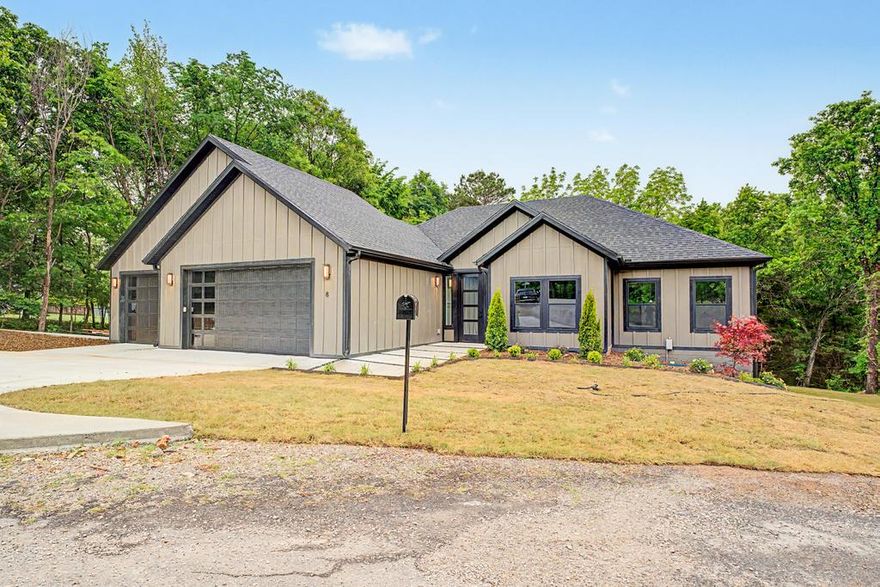 Experience an exceptional opportunity in this stunning modern Craftsman home, where elegance meets comfort! This beautifully designed residence features 3/4 spacious beds or an office and three luxurious baths, highlighted by custom tile work throughout and on SEWER.

The heart of the home is a breathtaking kitchen with a waterfall center island, perfect for cooking and entertaining. The expansive living space flows seamlessly to large sliding doors, leading to an extended deck—ideal for outdoor gatherings.

Set on a generous .4-acre lot, this property includes high-end custom outdoor only furniture & a cozy fireplace, creating an inviting atmosphere. A three-car garage provides ample space for vehicles & storage plus a massive driveway.

Located within walking distance to the clubhouse & golf course, this home is perfect for an active lifestyle. Plus, enjoy a $4,000 seller incentive to buy down your closing costs

With an ideal split-level layout, this home is perfect for entertaining and everyday living