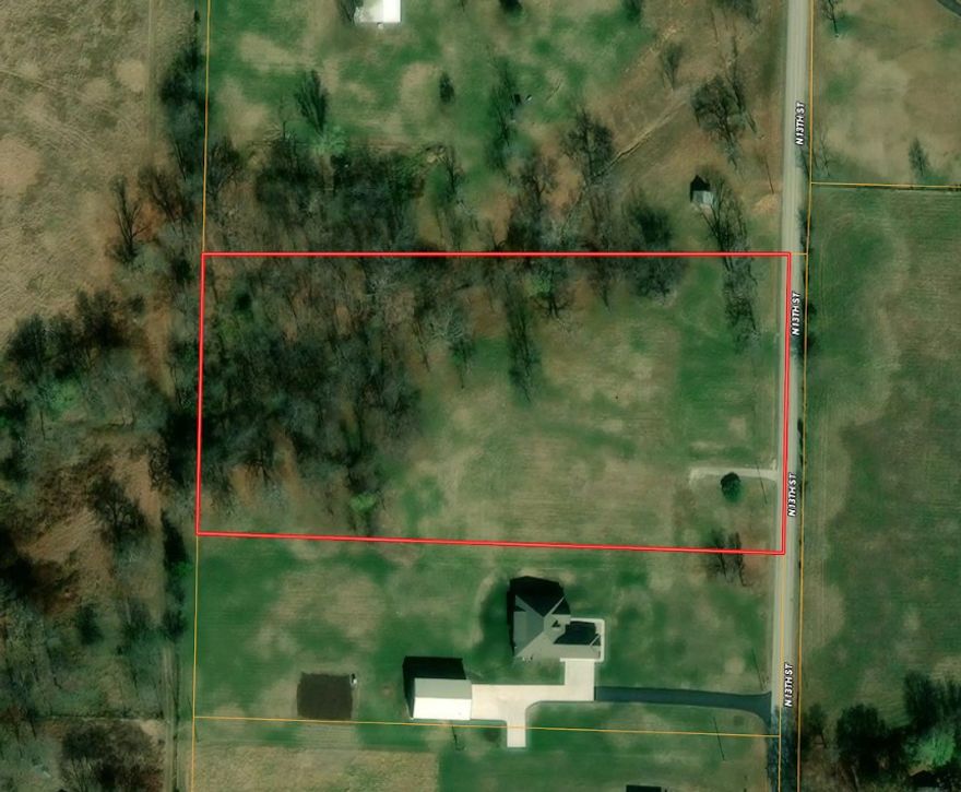 Prime opportunity awaits.  Location, Location, Location!  4.73 acres along paved road offering a chance to build in established area awaiting your dreams.  This hard to find opportunity and ready to develop site has water, natural gas, & electric at street. Only septic needed. Bring your vision and unlock the potential.  Survey & covenants are attached.