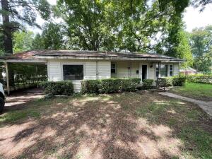 Must see this investment property! So many possibility's. 3 bed 1 bath with hardwood flooring Large fenced in backyard with storage building and Storm shelter.