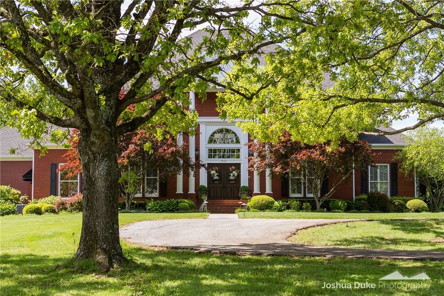 First time on the market!  Custom built C&S estate home in East Fayetteville on 7.5 acres.  This spacious home has 4 bedrooms, 5 baths, extra large eat-in kitchen, 2 large living areas, formal dining room and office.  Lovely outdoor living area with pool.  The master suite is on the main level with a wood burning fireplace.  3 bedrooms and baths upstairs along with a game room and plentiful attic storage.  Beautiful country setting just 10 minutes from almost everything in town.  A pond is on the property which is a source of irrigation system.  Exceptional quality home that would make the perfect place to raise a family.