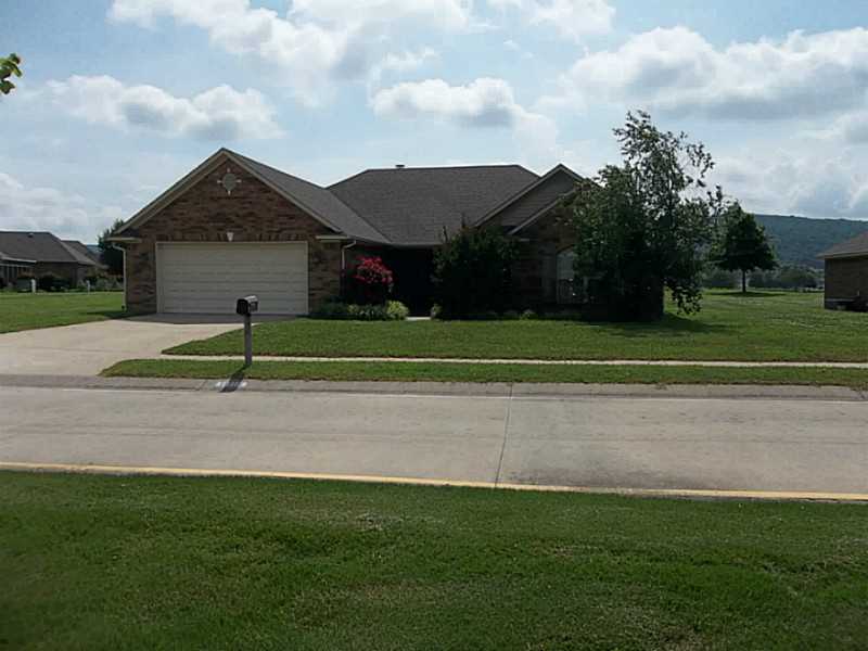 Beautiful 3 br 2 bath home with woodburning fireplace in the living room. Nice kitchen and eating area. Backs up to hole #8 at Valley View Golf course.