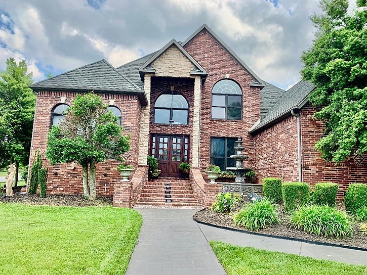 A luxury home, 4,412 ft, sitting on a corner lot, located in the middle of the most popular shopping and restaurant locations in Northwest Arkansas yet tucked away in a gated community with walking trails. Interstate access and central location make this a coveted home and neighborhood.
This home was originally built and designed by famous artist Robert Daughters, a familiar icon in a long tradition of legendary Southwest painters. This home is an open layout with multiple ensuites and filled with beautiful artistic designs throughout with extensive crown molding, columns, cathedral ceilings, custom window treatments and fountains. A heated gunite pool and private backyard.