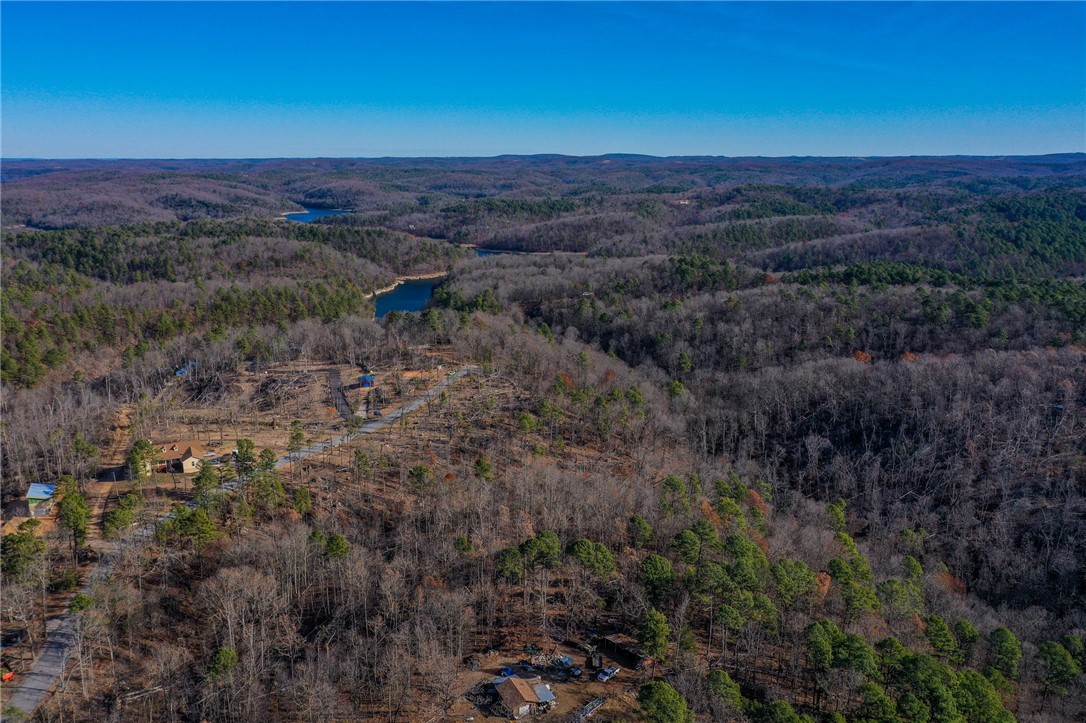 A dream come true for recreation lovers! Situated right opposite War Eagle Cavern, this 11.96-acre
property lies within 2.5 miles of Hobbs State Park and is just 2 miles from the Karst Loop and Pigeons
Roost Trailheads. It's the perfect spot to construct your dream home or create the ultimate vacation
getaway and sanctuary.