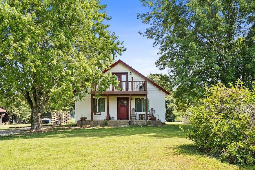 This updated 3-bedroom, 1-bath home (currently an Airbnb) offers 1221 sf of thoughtfully designed space, blending rustic charm with contemporary updates.  Inside, you'll find hardwood floors, eye-catching exposed beams, and a modern farmhouse design that brings warmth and character to every room.  The electric fireplace adds a cozy touch, while the upstairs area provides flexible space for an additional bedroom, office, or den.  The home has been updated with new electrical wiring, plumbing, siding, roof, doors, windows and a brand-new septic system--peace of mind included at no extra cost. Step outside to enjoy your own personal retreat with an above-ground pool, hot tub, and a custom-built bar perfect for entertaining. Whether you're relaxing around the fire pit or hosting a backyard gathering on the deck, this property is meant for memorable moments. An on-site barn offers endless possibilities for tools and storage. Located in a scenic country setting, it's just down the road from local hangout JB Trading Co!