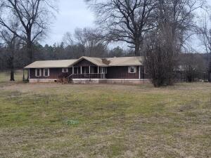 7 Beautiful Rural Acres- Ready for Your vision! **ADDITIONAL ACREAGE AVAILABLE**Nestled in the countryside, this 7-acre property offers peace, privacy, and endless possibilities. Equipped with water, electric and septic, its ready for your next home or getaway. 30'x44' shed includes a 24'x10' fully enclosed space, perfect for storage or a workshop.An older 3-bedroom, 2-bath mobile home is included AS-IS and could be repaired or replaced to suit your needs. Located close to the National Forest, this property is ideal for hunters, outdoor enthusiasts, or anyone looking to enjoy nature.Don't miss this opportunity-contact me today for more details!