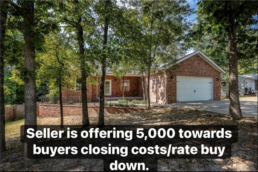 Best buy in Bella Vista! Seller is offering $5,000 towards buyer closing costs/rate buy down/buyer concessions with acceptable offer. This spacious 4-bedroom, 3-bath full-brick home in the Bentonville School District offers incredible value and room to make it your own. Located just minutes from trails, it features an open, split floor plan with hardwood floors, custom tile, granite countertops, and crown molding throughout. Recent updates include a newer roof and HVAC system, plus a brand-new range and microwave for added peace of mind. Sitting on a sewered lot, the backyard is a blank canvas—perfect for designing your ideal outdoor oasis. Enjoy both a welcoming front porch and a back deck for relaxing or entertaining. With a little personalization, this home is a fantastic opportunity to gain space, location, and long-term value. Don’t miss out!