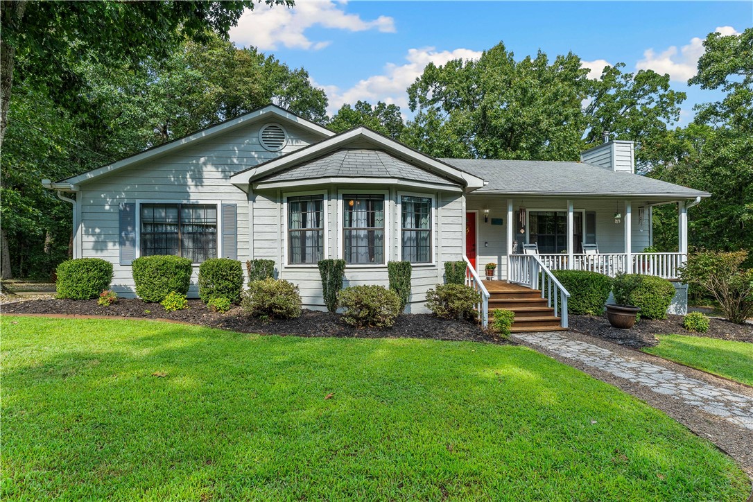 Charming, well-maintained 3 bed 2 bath cottage-like house, nestled in a private, serene neighborhood offers both comfort and convenience. Beautifully landscaped yard with mature trees, privacy, and a place to park the RV! Enjoy the oversized deck perfect for entertaining or unwinding. Open-concept living area with vaulted ceilings, wood-burning stove, and new hardwood floors. Kitchen is open to living area w/granite counters and breakfast bar. Large master suite offers access to deck, large tub and walk-in closet. Additional features include storage shed/workshop and fenced backyard. Conveniently located ½ mi to Branchwood Fitness/Pool, 2 miles to Highlands Clubhouse, 3 mi to Lake Lock Lomond Marina, and near schools, parks, and shopping. Refrigerator and propane tank will convey. $2000 Carpet Allowance!!