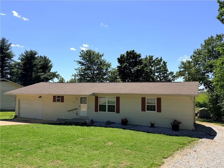 This well-maintained 3-bedroom, 2-bathroom home offers the perfect blend of privacy and convenience at the end of a quiet town road. Ideal for family living, the property features a wonderful covered deck and a spacious backyard. The front yard has fresh sod laid in April 2026. The interior has been thoughtfully updated, including new flooring throughout (except one bedroom) and a new French door installed in 2025, complemented by windows and an HVAC system replaced in 2010. For peace of mind, the home is equipped with an air purifier on the A/C, a gas wall heater for backup heat, and programmable Wyze security lights. Two storage buildings measuring 10x16 and 8x16. Parking is a breeze with a single main-floor garage plus a large attached carport at the basement level, making this move-in-ready home a necessity for your family!!!