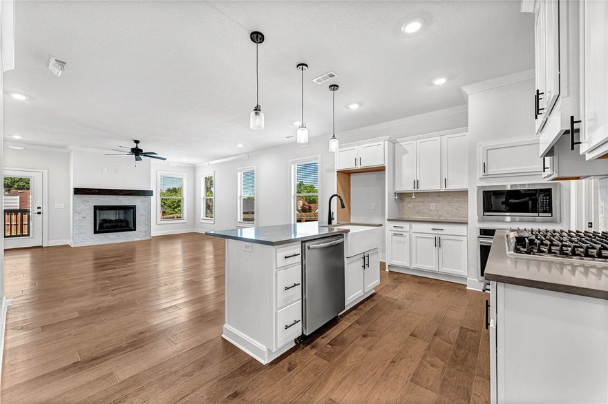 This modern, like-new home offers the perfect blend of style, space, and function! Ideally situated in a newer Rogers neighborhood just minutes from downtown, top-rated schools, shopping, dining, and the Rogers Aquatic Center, this home features a spacious and private front office with elegant French doors, a chef-worthy kitchen with Frigidaire appliances, and an oversized walk-in pantry that’s sure to impress. Additional main-level highlights include a mudroom and large utility room, plus a second laundry hookup for a stackable unit upstairs. The upper level also features a versatile landing area with a built-in desk—ideal for homework or a home workspace. Step outside to enjoy the covered patio with ceiling fan, an 8-foot privacy fence along the back, an irrigation system, and a handy storage building. This home truly has it all!