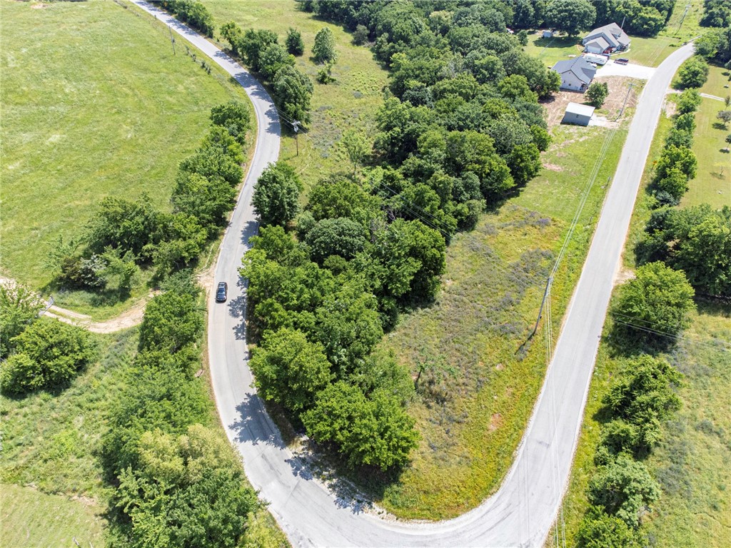 BUILD YOUR DREAM HOME! Are you looking for a rural location to place some roots and build your dream home or hobby farm? Look no further! This 3.44 Acre tract off of Greasy Valley road in Prairie Grove is just what you have been waiting for! Located 10 minutes away from Lincoln and Prairie Grove, this tract is perfect for those looking for privacy while being a short drive from town amenities such as shopping, parks, and more! On site septic needed. Rural Water tap needed. Don't miss out! Act now!