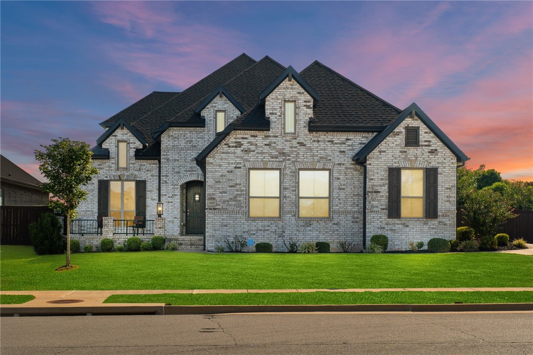 A rare opportunity to own a Phase 2 home in Lochmoor Club, one of Bentonville's most sought-after communities! Perfectly positioned 0.33 acre lot with a sunset view from the front porch and sunrise views for your coffee on the covered back patio. With the Bentonville Greenway paved trail system directly behind, this home blends privacy, recreation and convenience. Inside you'll find soaring ceilings and upgraded 10ft. tall doors on the first level. Abundant natural light and a thoughtfully designed layout create a warm, open flow. The chef's kitchen boasts ceiling-height cabinetry, quartz countertops and a gas cooktop - opening into the living and dining areas for effortless entertaining. You'll find four spacious bedrooms and three full baths on the main level and an expansive bonus room and half bath upstairs. The covered patio is equipped with a fireplace and has remote-controlled mechanical screens around the perimeter. Living in Lochmoor Club means more than just a beautiful home — it’s a community.